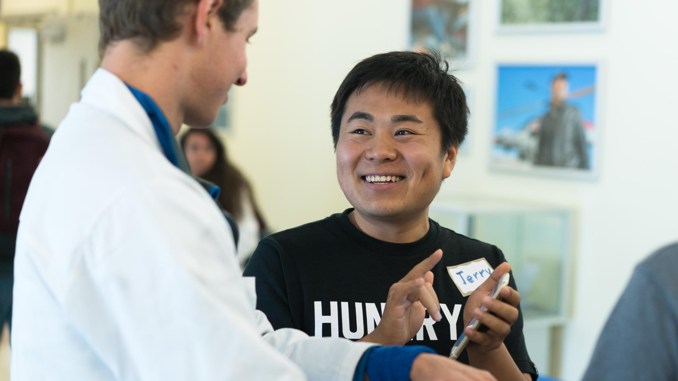 student collaborating with researcher